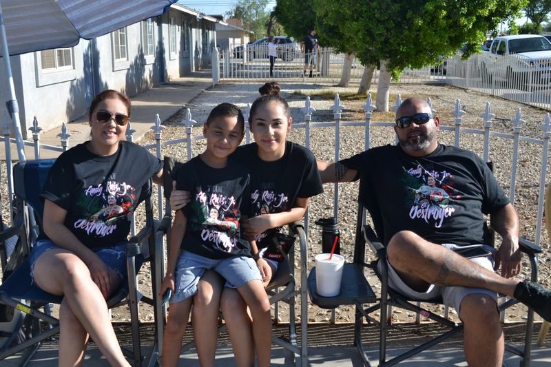 Victor Ponce and family wait for the parade honoring their cousin, Andy Ruiz Jr.